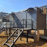 Steel access staircase and landing to a containerised plant room