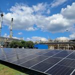 Close view of a ground-mounted solar PV array installed by Ngawakho Projects